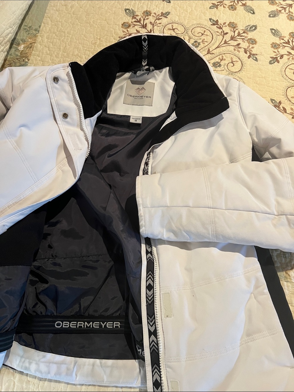 Obermeyer White and Black Ski Jacket with Logo Trim